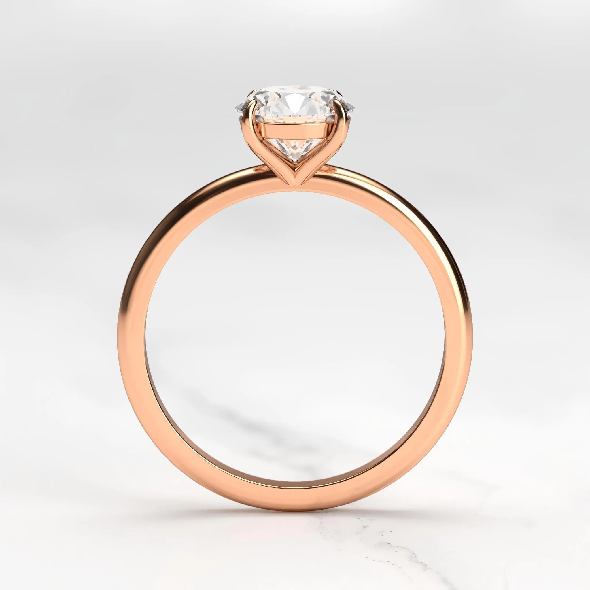 Round Tapered Solitaire Diamond Ring