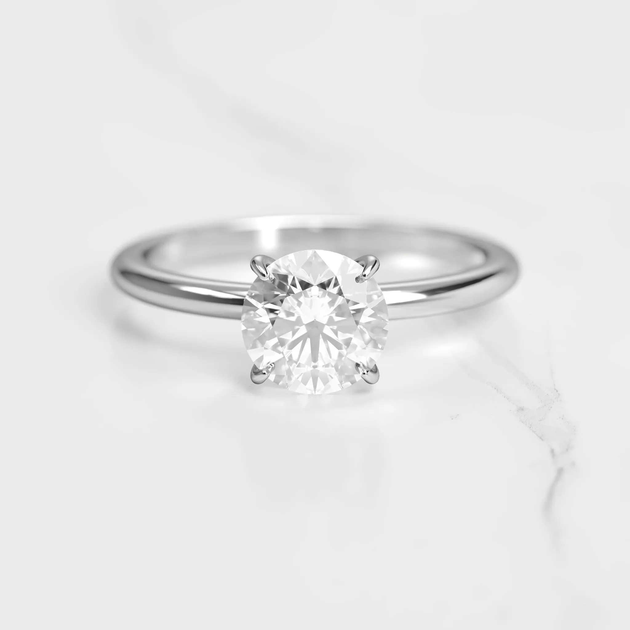 Round Tapered Solitaire Diamond Ring