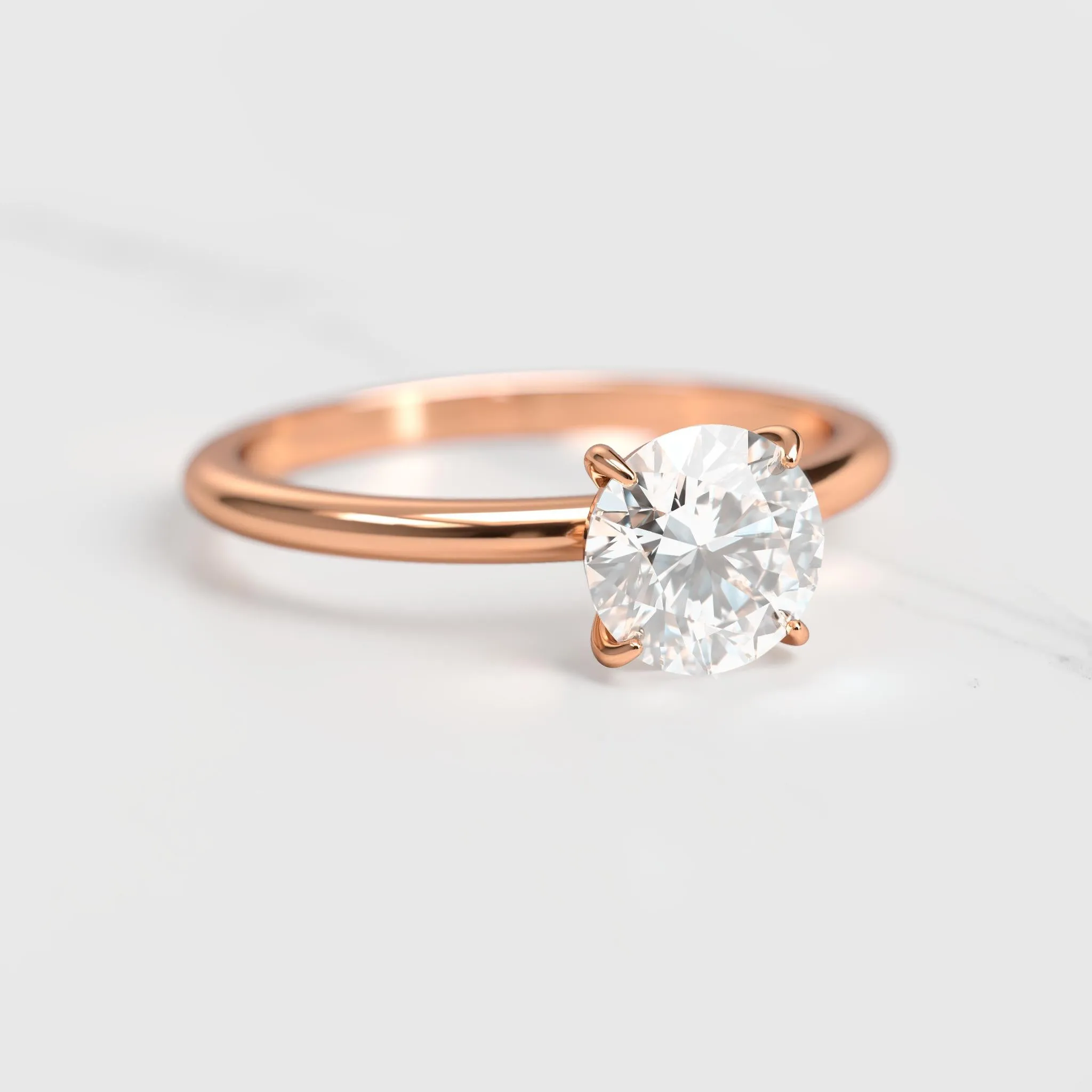 Round Tapered Solitaire Diamond Ring